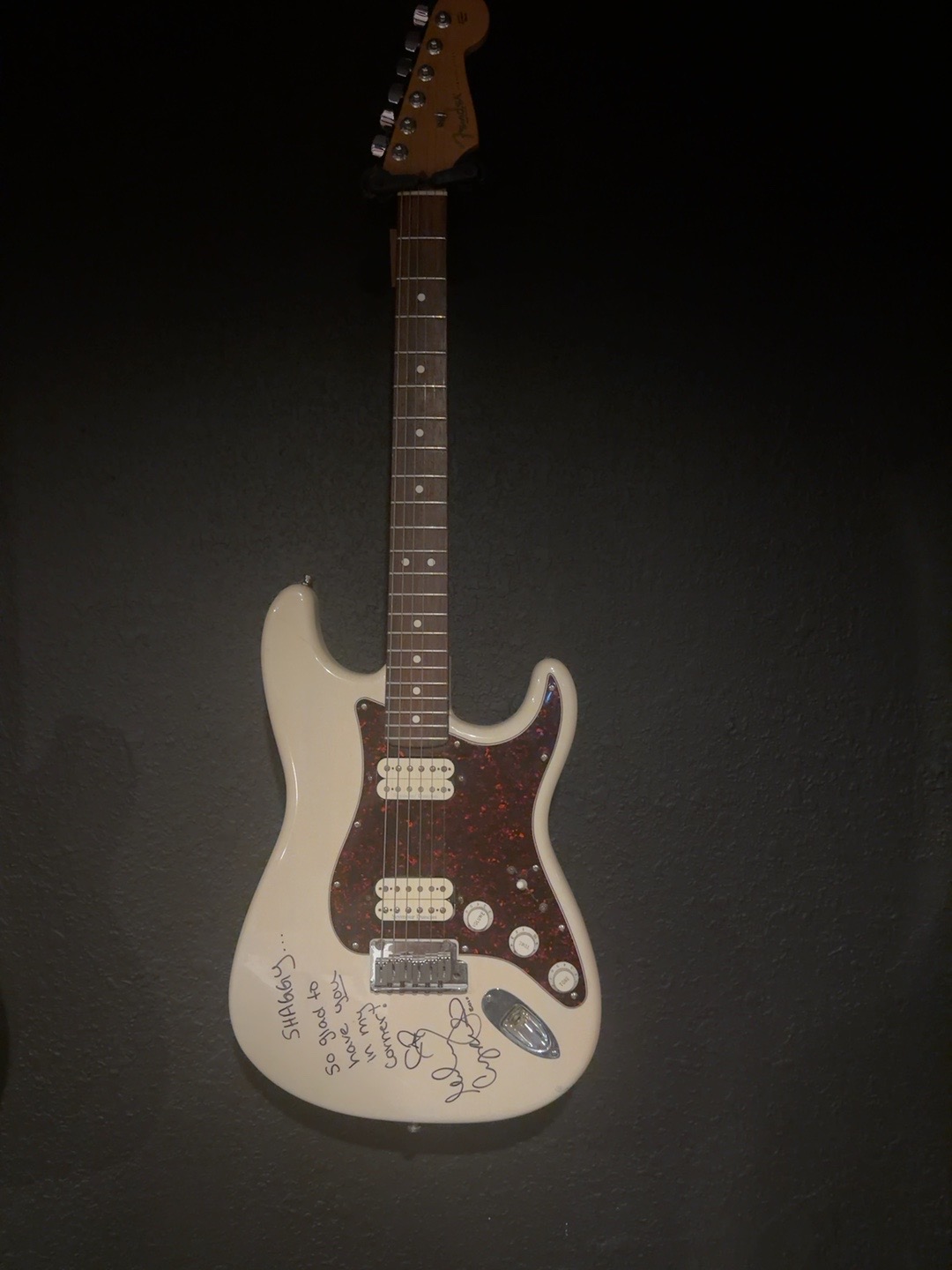 Full guitar signed and personalized by Miley Cyrus for Shaggy