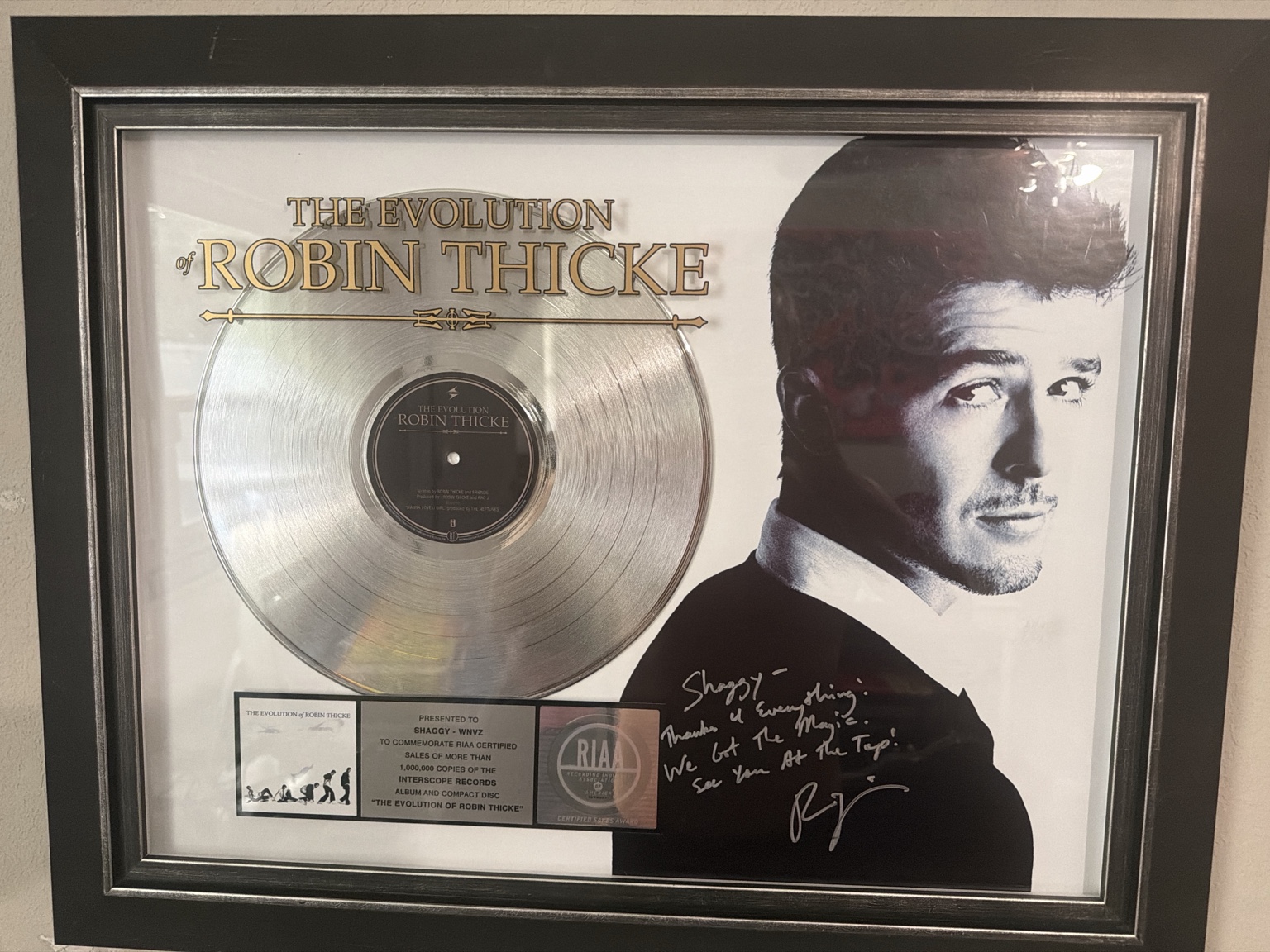 Robin Thicke: A personalized, signed plaque commemorating more than one million U.S. album sales for The Evolution of Robin Thicke.