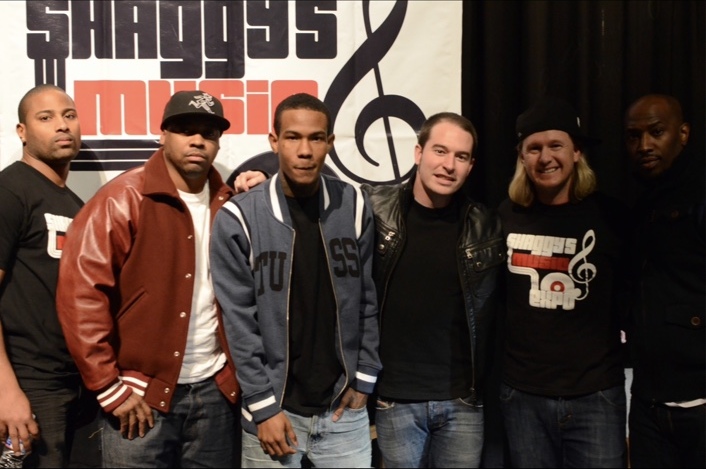 Shaggy with guests and music leaders at the expo