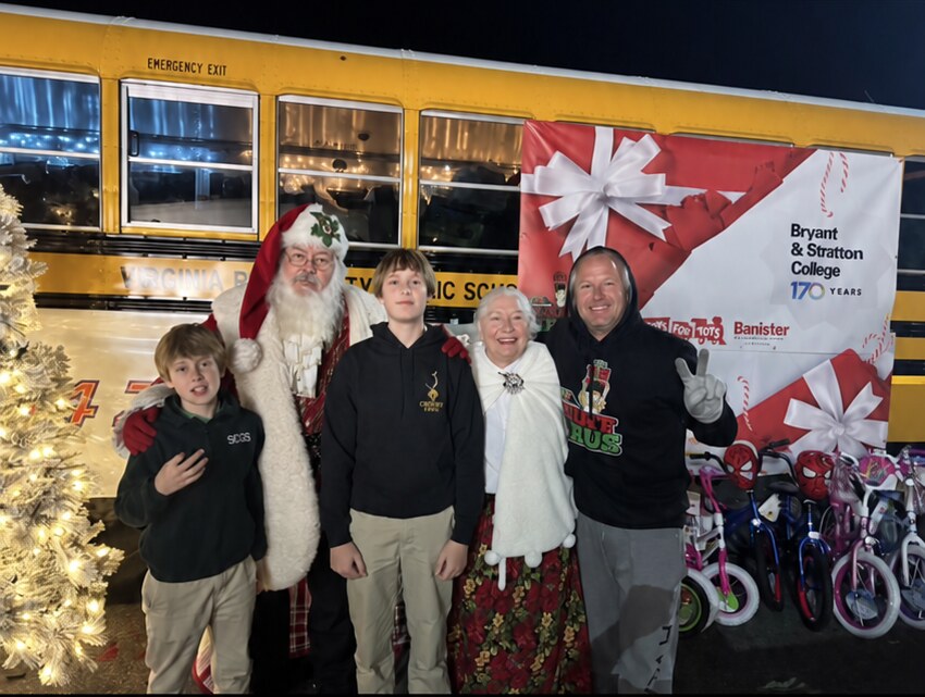 Shaggy and his sons with Santa and Mrs. Claus at Stuff the Bus