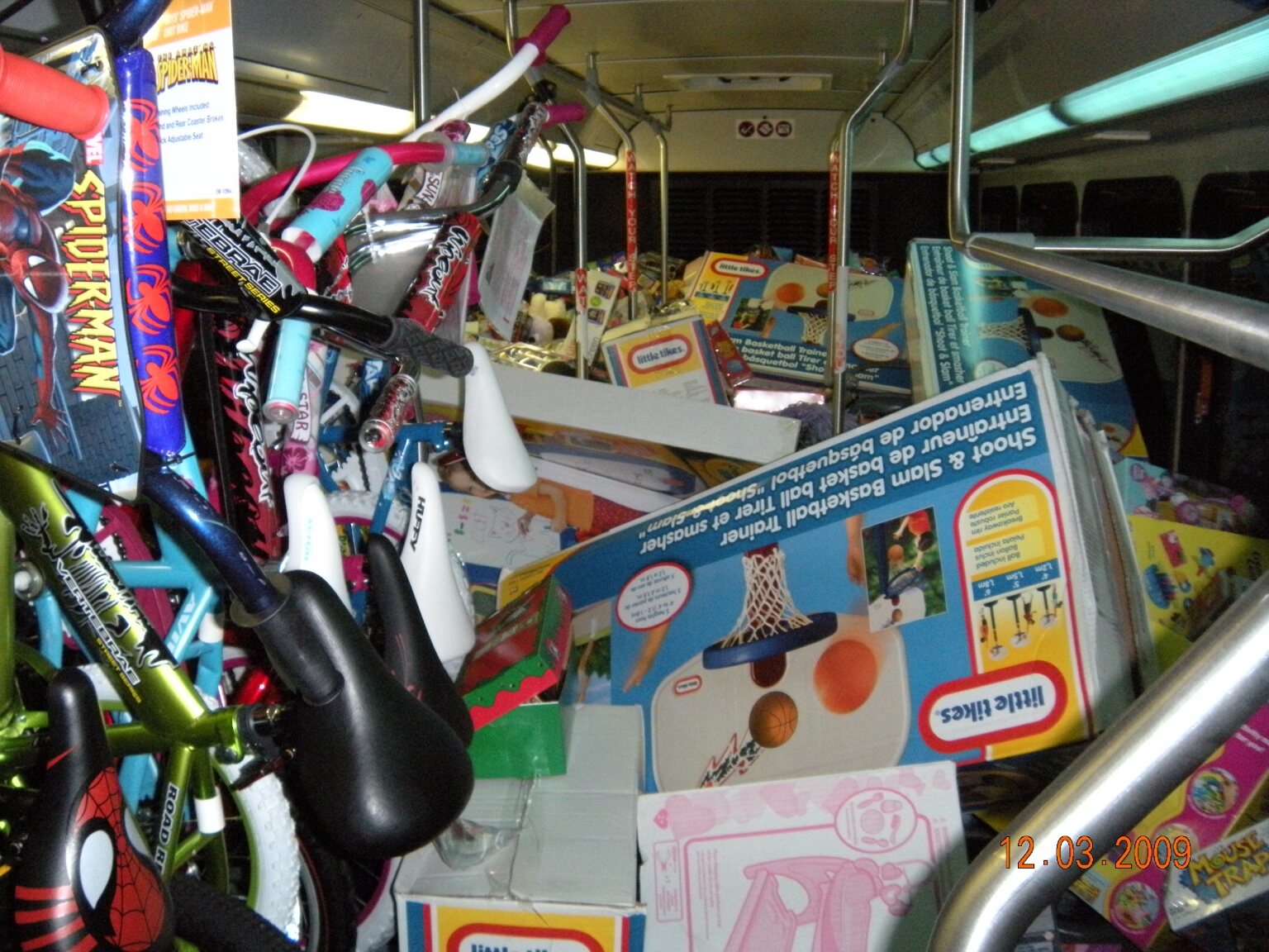 The Stuff the Bus bus packed with donated bikes and toys in 2009