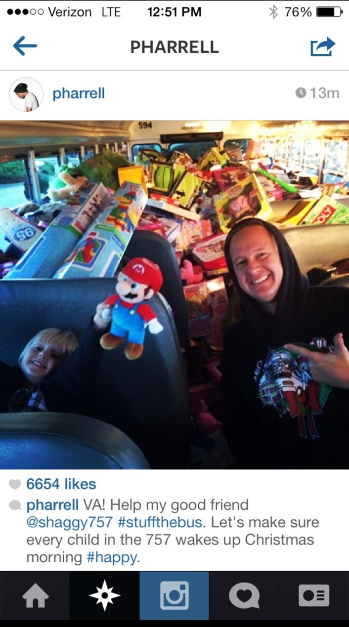 Pharrell Williams supporting Shaggy and his son Brody at Stuff the Bus on Instagram in 2013